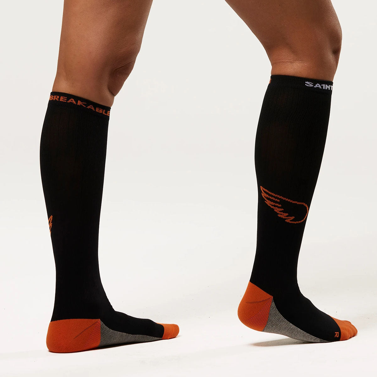 Does wearing compression stockings help in minimising varicose